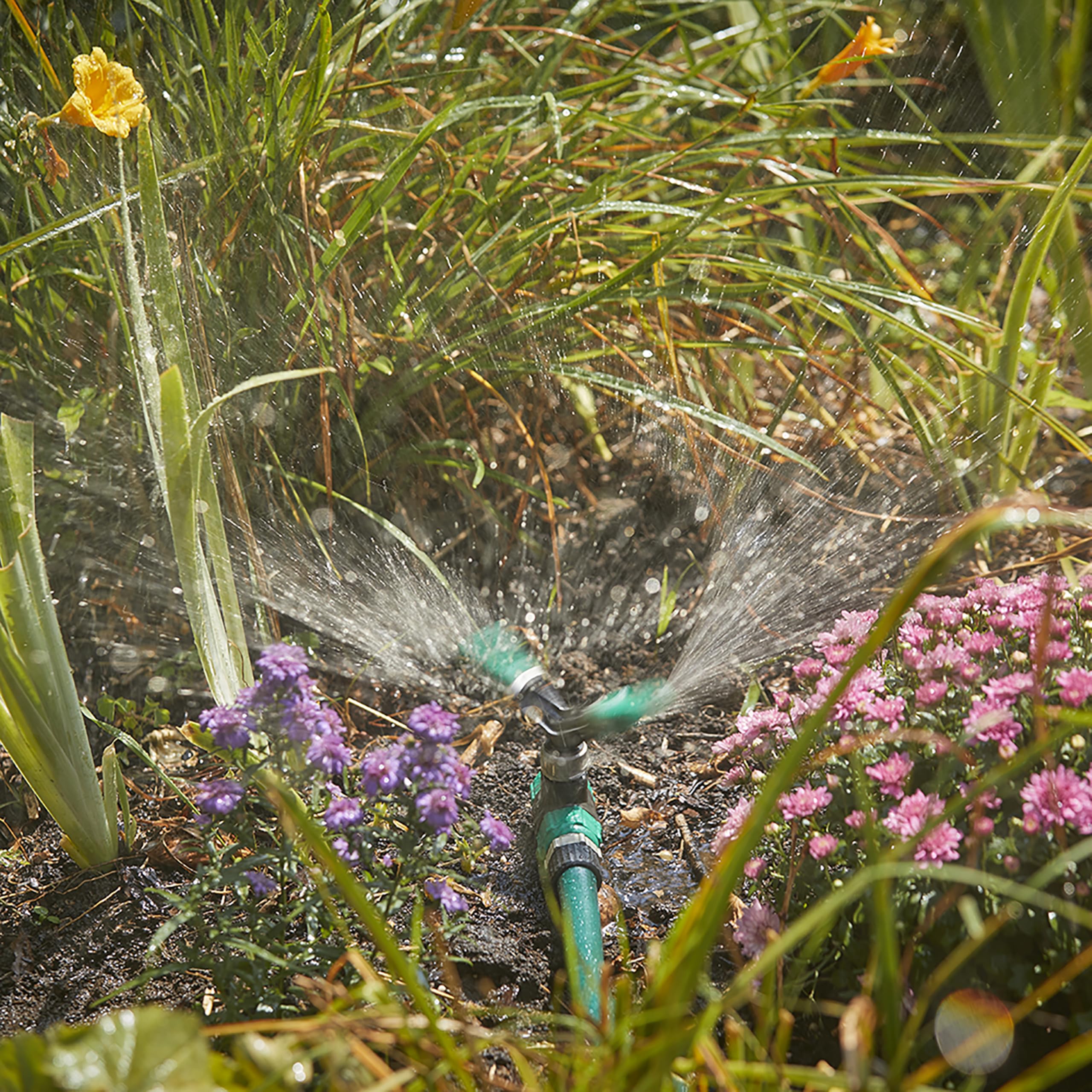 Gilmour Adjustable Spinning Sprinkler with Spike Base, Whirling Sprinkler Head for 360 Degree Coverage in Flower Beds and Vegetable Gardens - Image 6